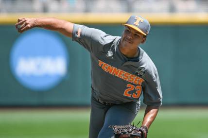 Jun 19, 2023; Omaha, NE, USA;  Tennessee Volunteers pitcher Chase Burns (23) throws against the Stanford Cardinal in the fourth inning at Charles Schwab Field Omaha. Mandatory Credit: Steven Branscombe-USA TODAY Sports