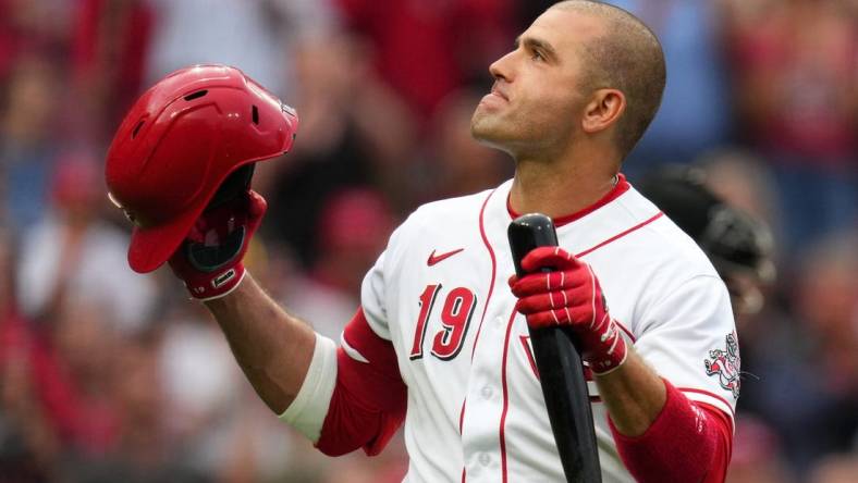 Cincinnati Reds first baseman Joey Votto (19) is recognized by the crowd before his first at-bat of the season in the second inning of a baseball game between the Colorado Rockies and the Cincinnati Reds, Monday, June 19, 2023, at Great American Ball Park in Cincinnati.