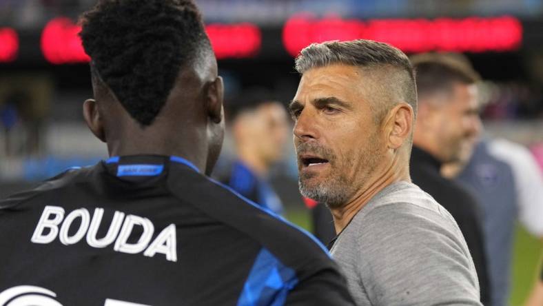 Jun 17, 2023; San Jose, California, USA; San Jose Earthquakes head coach Luchi Gonzalez (right) talks to forward Ousseni Bouda (25) after the game against the Portland Timbers at PayPal Park. Mandatory Credit: Darren Yamashita-USA TODAY Sports