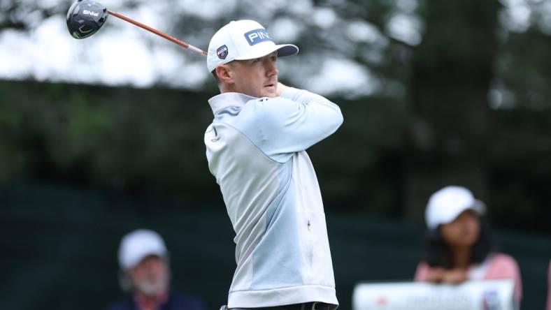 Jun 22, 2023; Cromwell, Connecticut, USA; Mackenzie Hughes plays his shot from the tenth tee during the first round of the Travelers Championship golf tournament. Mandatory Credit: Vincent Carchietta-USA TODAY Sports