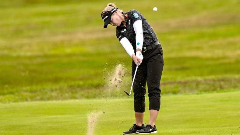 Jun 22, 2023; Springfield, New Jersey, USA; Brooke Mackenzie Henderson plays a shot from the fairway on the 18th hole during the first round of the KPMG Women's PGA Championship golf tournament. Mandatory Credit: John Jones-USA TODAY Sports