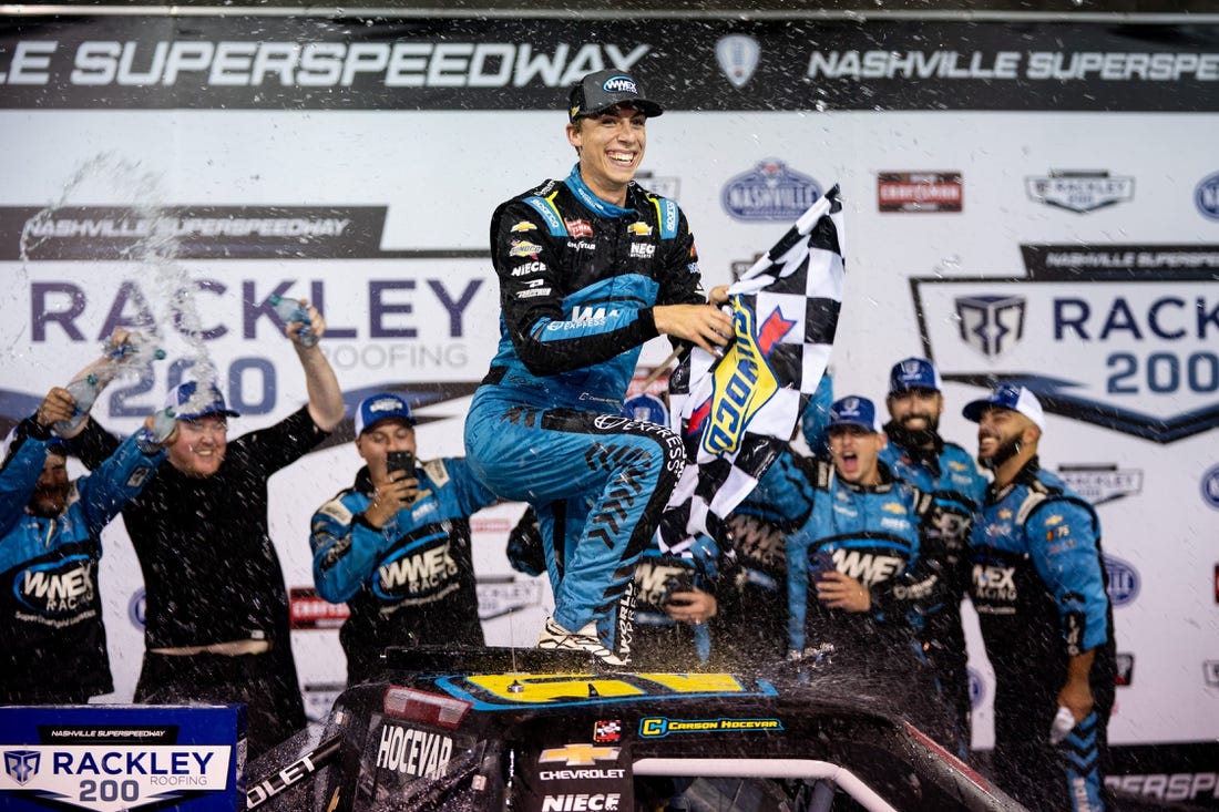 NASCAR Craftsman Truck Series driver Carson Hocevar celebrates winning the Rackley Roofing 200 Race at Nashville Superspeedway in Lebanon, Tenn., Friday, June 23, 2023.