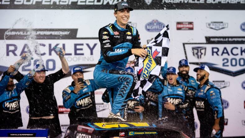 NASCAR Craftsman Truck Series driver Carson Hocevar celebrates winning the Rackley Roofing 200 Race at Nashville Superspeedway in Lebanon, Tenn., Friday, June 23, 2023.