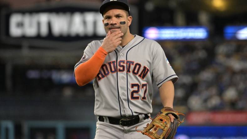 Jun 23, 2023; Los Angeles, California, USA;  Houston Astros second baseman Jose Altuve (27) walks off the field following the sixth inning against the Los Angeles Dodgers at Dodger Stadium. Mandatory Credit: Jayne Kamin-Oncea-USA TODAY Sports