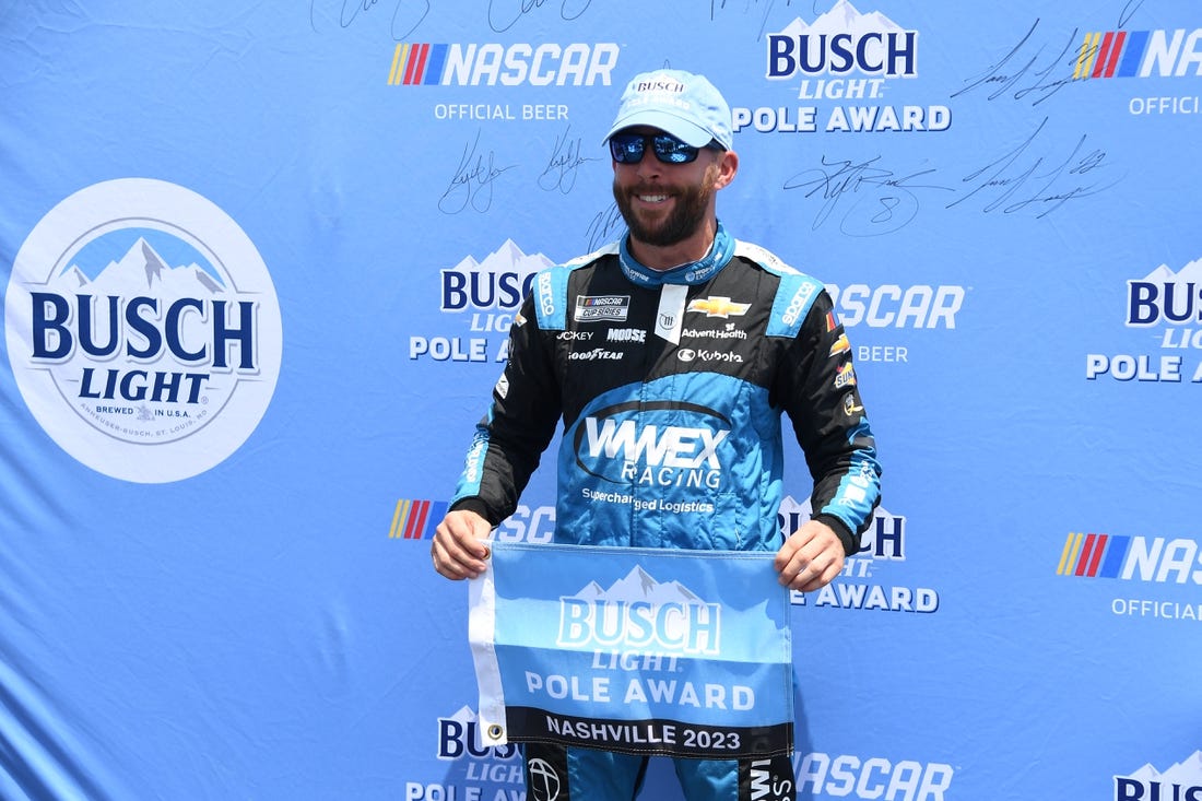 Jun 24, 2023; Nashville, Tennessee, USA; NASCAR Cup Series driver Ross Chastain (1) after winning the pole during qualifying at Nashville Superspeedway. Mandatory Credit: Christopher Hanewinckel-USA TODAY Sports