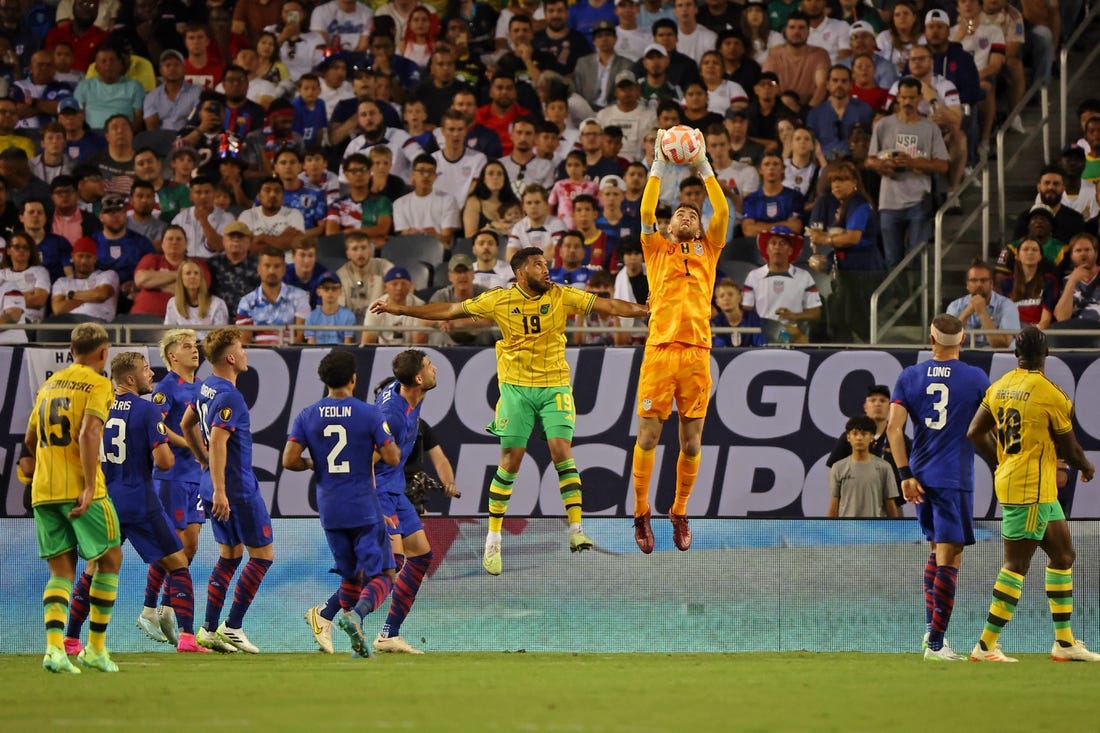 Jun 24, 2023; Chicago, Illinois, USA; United States goalkeeper Matt Turner (1) makes a save against Jamaica defender Adrian Mariappa (19) during the first half at Soldier Field. Mandatory Credit: Jon Durr-USA TODAY Sports