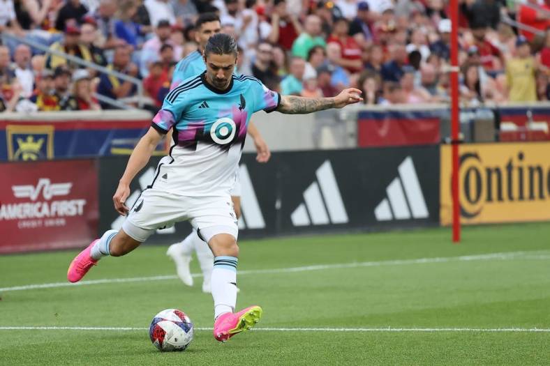 Jun 24, 2023; Sandy, Utah, USA;  Minnesota United FC defender Zarek Valentin (3) clears a ball against Real Salt Lake in the first half at America First Field. Mandatory Credit: Rob Gray-USA TODAY Sports
