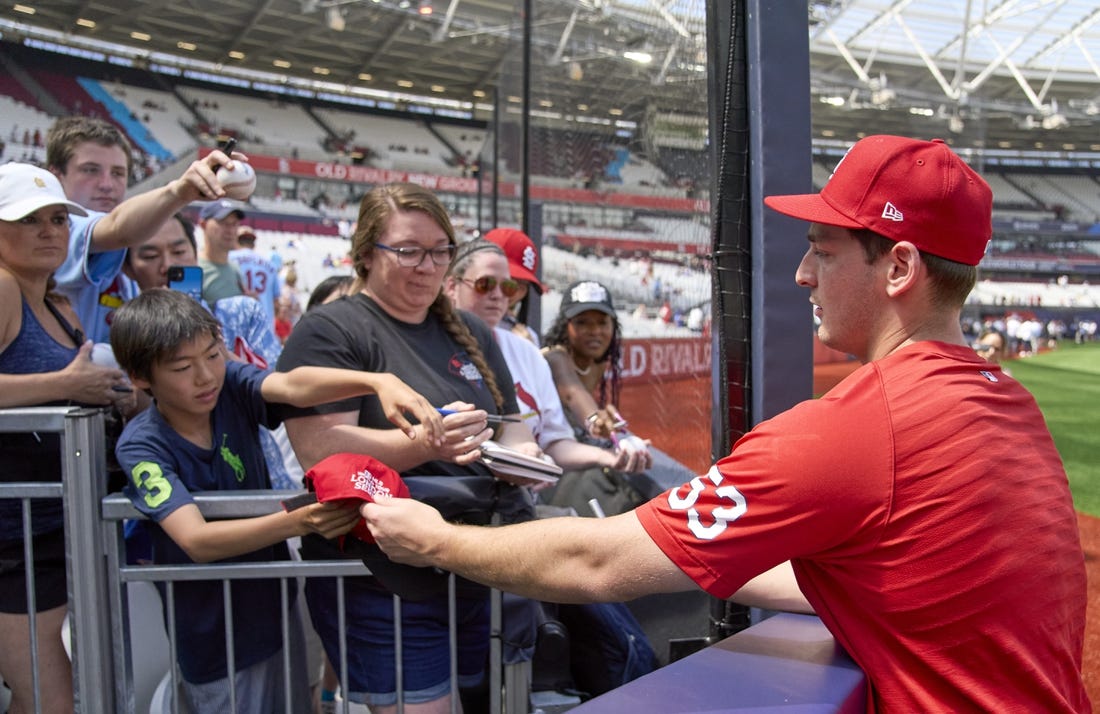 Jun 25, 2023; London, GBR, ENG; St. Louis Cardinals starting pitcher Andre Pallante (53) signs autographs for fans before London series game two against the Chicago Cubs at London Stadium. Mandatory Credit: Peter van den Berg-USA TODAY Sports