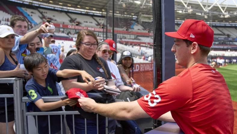 Jun 25, 2023; London, GBR, ENG; St. Louis Cardinals starting pitcher Andre Pallante (53) signs autographs for fans before London series game two against the Chicago Cubs at London Stadium. Mandatory Credit: Peter van den Berg-USA TODAY Sports