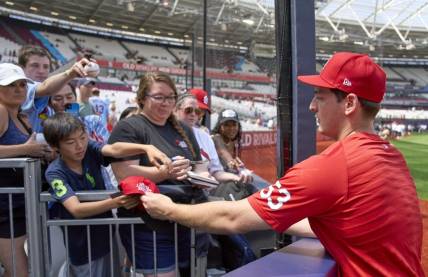Jun 25, 2023; London, GBR, ENG; St. Louis Cardinals starting pitcher Andre Pallante (53) signs autographs for fans before London series game two against the Chicago Cubs at London Stadium. Mandatory Credit: Peter van den Berg-USA TODAY Sports