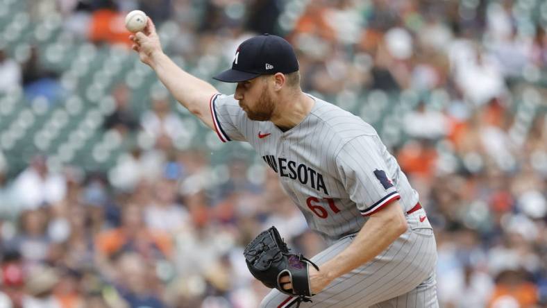 Jun 25, 2023; Detroit, Michigan, USA; Minnesota Twins relief pitcher Brock Stewart (61) pitches in the eighth inning against the Detroit Tigers at Comerica Park. Mandatory Credit: Rick Osentoski-USA TODAY Sports