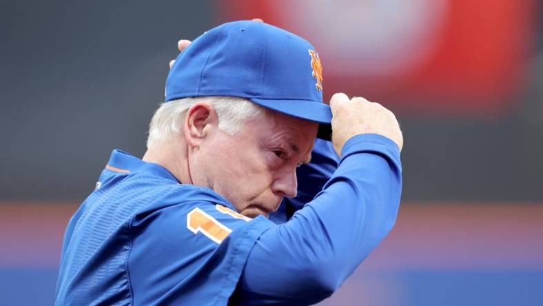 Jun 26, 2023; New York City, New York, USA; New York Mets manager Buck Showalter (11) walks back to the dugout after the national anthem before a game against the Milwaukee Brewers at Citi Field. Mandatory Credit: Brad Penner-USA TODAY Sports
