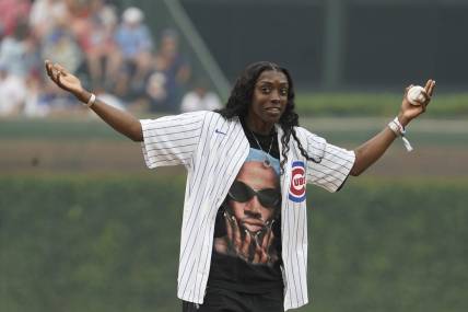 Jun 27, 2023; Chicago, Illinois, USA; Chicago Sky   s WNBA player Kahleah Copper throws a ceremonial first pitch before the game between the Chicago Cubs and the Philadelphia Phillies at Wrigley Field. Mandatory Credit: David Banks-USA TODAY Sports