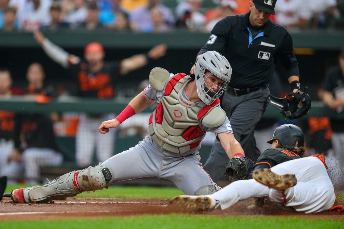 Reds beat Orioles 11-7 in 10 innings to win series