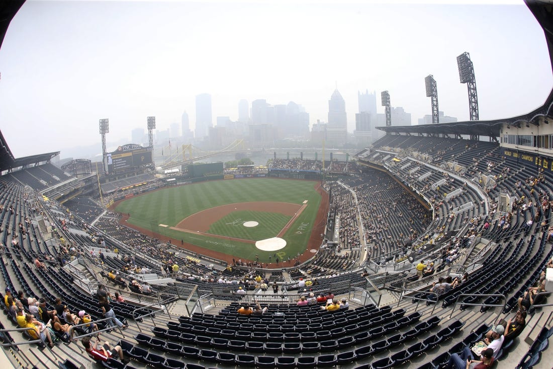 Jun 29, 2023; Pittsburgh, Pennsylvania, USA; A general view of smoky skies, a result of the Canadian wildfires, obscuring the Pittsburgh downtown skyline and delays the start of the game between the San Diego Padres and the Pittsburgh Pirates at PNC Park. Mandatory Credit: Charles LeClaire-USA TODAY Sports