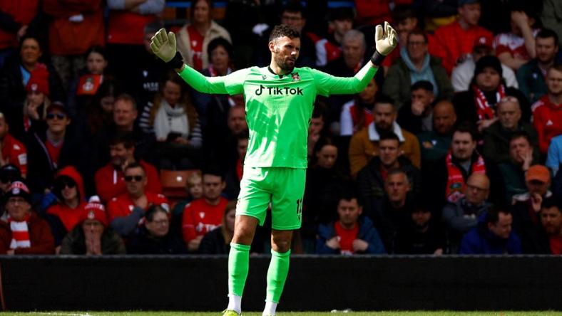 Ben Foster, 40, agreed to return to Wrexham AFC for one more season after the team was promoted to League Two.