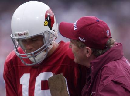 Cardinals quarterback Jake Plummer talks with coach Vince Tobin during a game against the Giants on Sept. 3, 2000.

Cards Giants Jake Plummer Vince Tobin