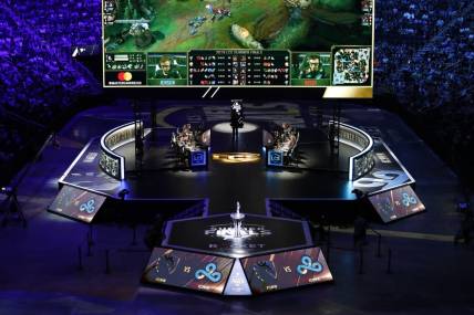 Aug 25, 2019; Detroit, MI, USA; Team Liquid (center left) competes against Cloud9 (center right) during the LCS Summer Finals event at Little Caesars Arena. Mandatory Credit: Raj Mehta-USA TODAY Sports