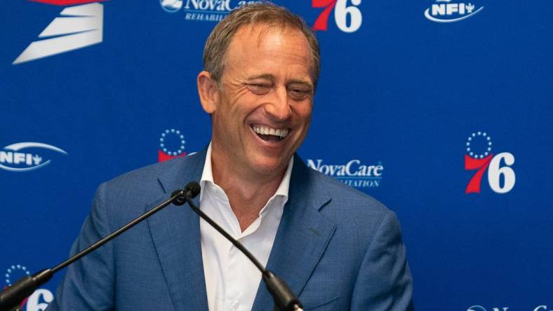 Sep 13, 2019; Philadelphia, PA, USA; Philadelphia 76ers managing partner Josh Harris speaks at the podium during the sculpture unveiling ceremony honoring Charles Barkley at the Philadelphia 76ers Training Complex. Mandatory Credit: Bill Streicher-USA TODAY Sports