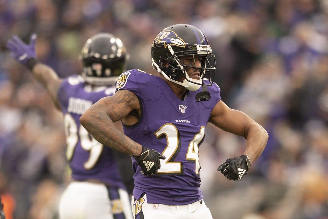 Nov 17, 2019; Baltimore, MD, USA;  Baltimore Ravens cornerback Marcus Peters (24) reacts after breaking up a pass on fourth down against the Houston Texans at M&T Bank Stadium. Mandatory Credit: Tommy Gilligan-USA TODAY Sports