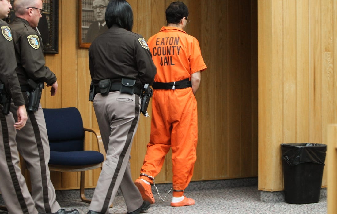 One of the very last times Larry Nassar was seen publicly, as he leaves Eaton County Court in Charlotte, Mich., Monday, Feb. 5, 2018, after being sentenced by Judge Janice Cunningham to 40-125 years in prison on three counts of sexual assault.  [MATTHEW DAE SMITH/Lansing State Journal]

Day Three Nassar Sentencing In Eaton County