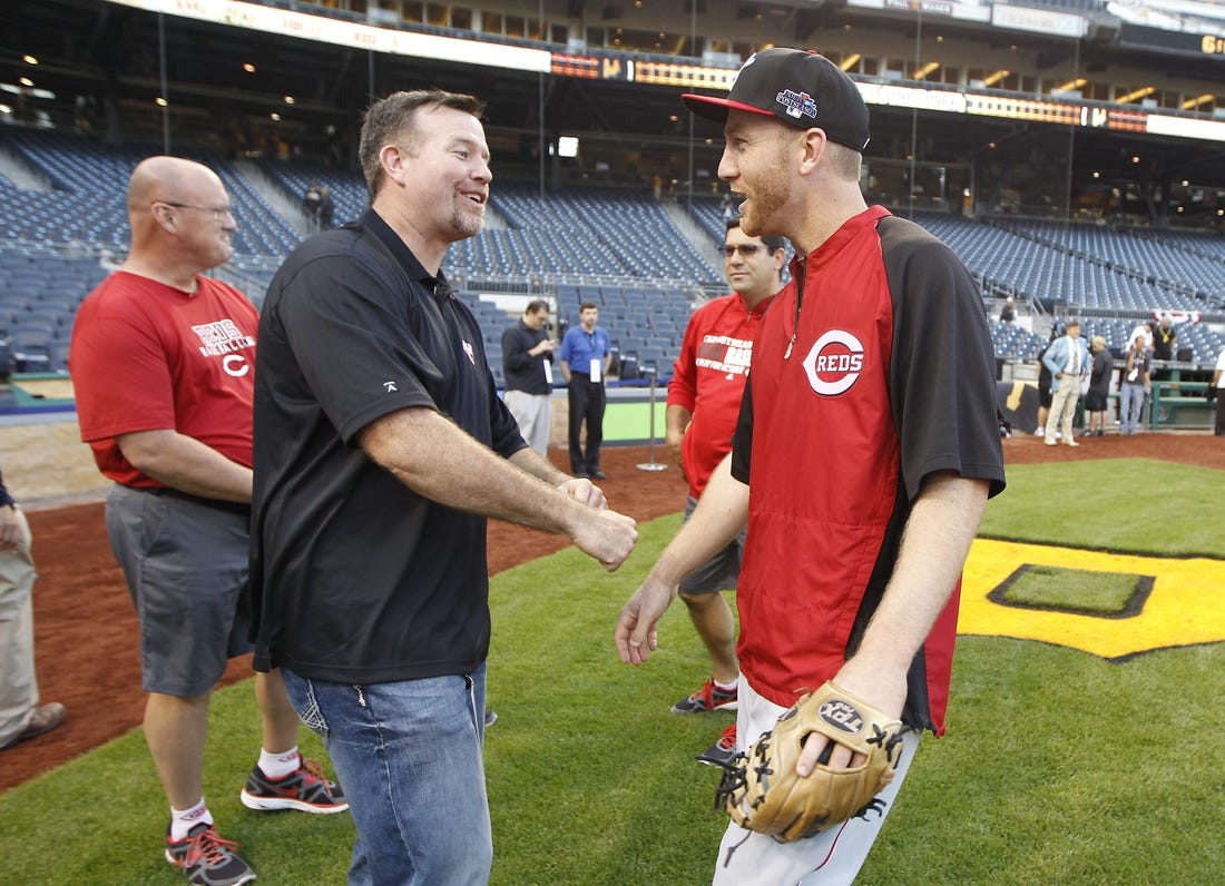 OCTOBER 1, 2013: Former Red Sean Casey and Reds third baseman Todd Frazier talk prior to a MLB Wild Card Playoff game against the Pittsburgh Pirates at PNC Park.

Reds