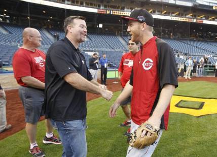 OCTOBER 1, 2013: Former Red Sean Casey and Reds third baseman Todd Frazier talk prior to a MLB Wild Card Playoff game against the Pittsburgh Pirates at PNC Park.

Reds