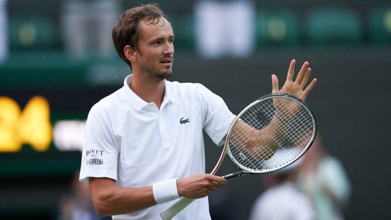 Jul 3, 2021; London, United Kingdom;  
Daniil Medvedev (RUS) seen celebrating after beating Marin Cilic (CRO) on No 1 court in the men s third round at All England Lawn Tennis and Croquet Club. Mandatory Credit: Peter van den Berg-USA TODAY Sports