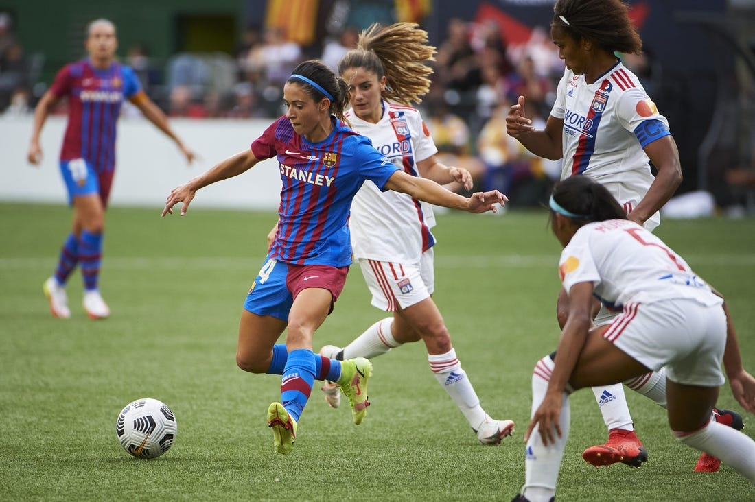 Aug 18, 2021; Portland, OR, USA;  FC Barcelona midfielder Aitana Bonmati (14) passes the ball against Olympique Lyonnais during the second half at Providence Park. Olympique Lyonnais won 3-2. Mandatory Credit: Troy Wayrynen-USA TODAY Sports