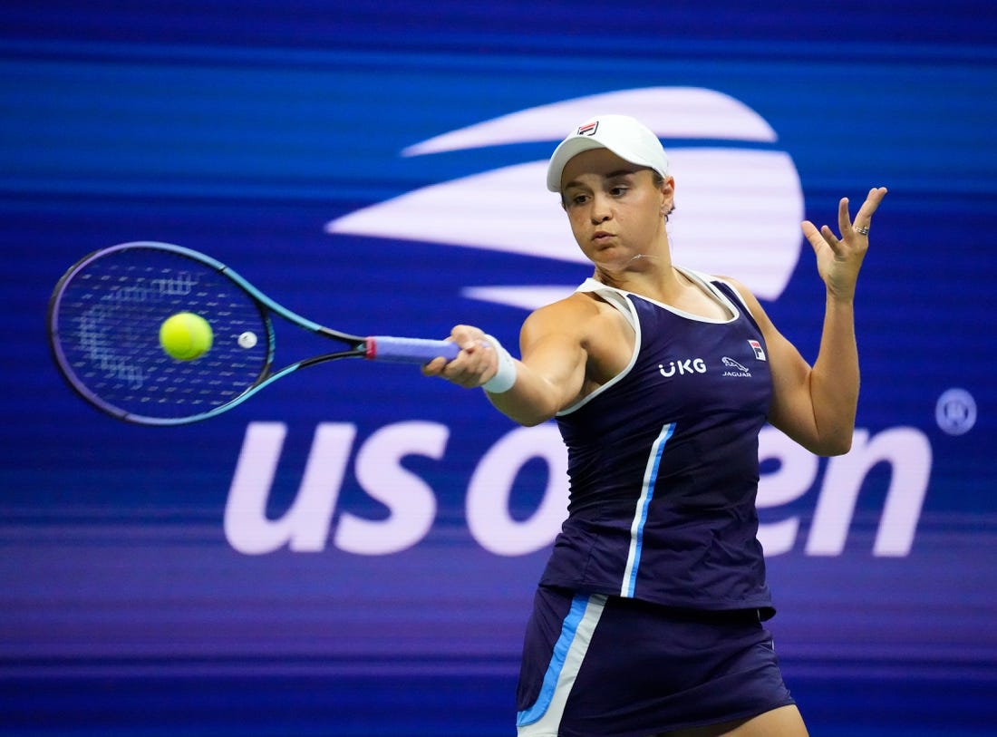 Sep 4, 2021; Flushing, NY, USA; 
Ashleigh Barty of Australia hits to Shelby Rogers of the USA on day six of the 2021 U.S. Open tennis tournament at USTA Billie Jean King National Tennis Center. Mandatory Credit: Robert Deutsch-USA TODAY Sports