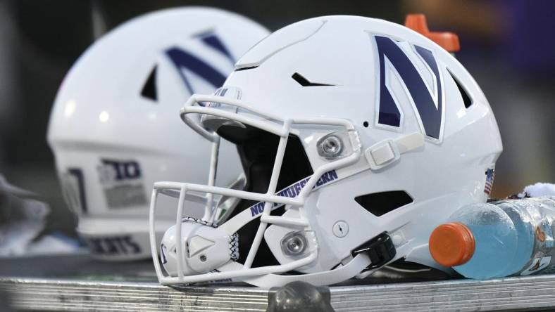 Sep 18, 2021; Durham, North Carolina, USA; A Northwestern Wildcats helmet sits on an equipment chest during the fourth quarter at Wallace Wade Stadium. Mandatory Credit: William Howard-USA TODAY Sports