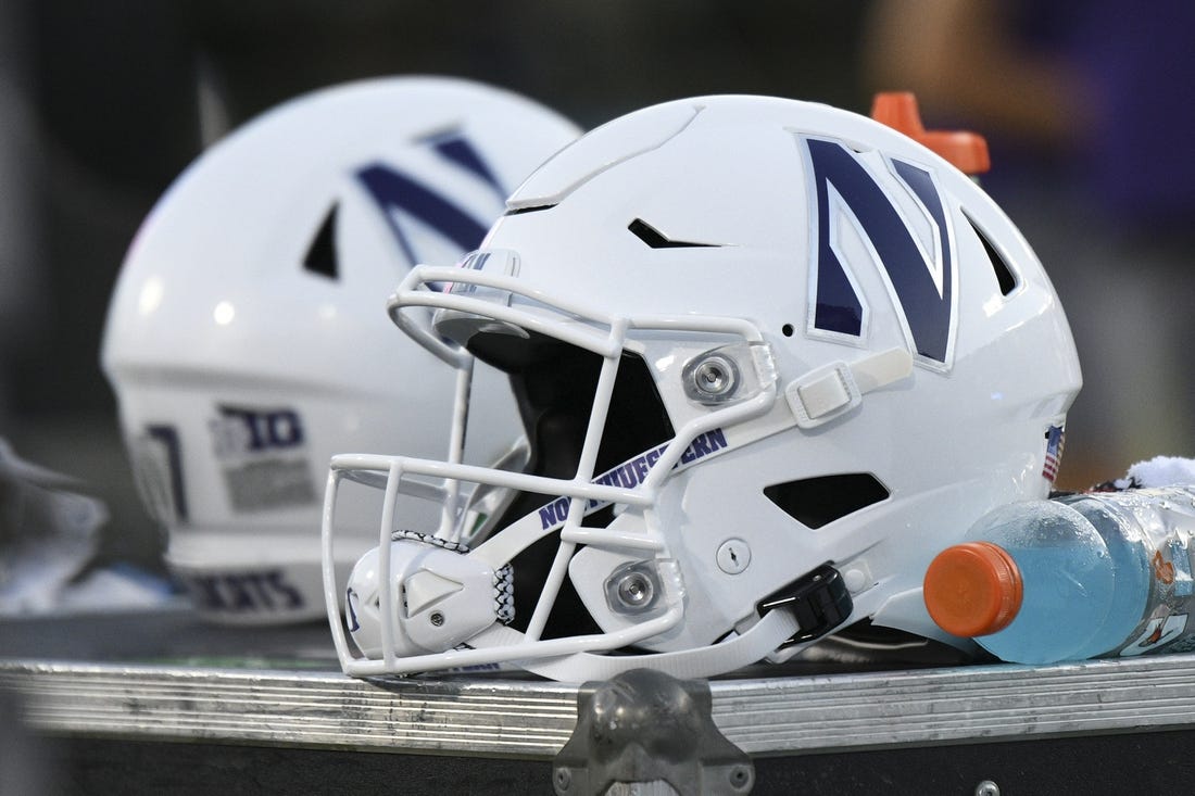 Sep 18, 2021; Durham, North Carolina, USA; A Northwestern Wildcats helmet sits on an equipment chest during the fourth quarter at Wallace Wade Stadium. Mandatory Credit: William Howard-USA TODAY Sports