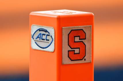 Sep 18, 2021; Syracuse, New York, USA; Detailed view of an end zone marker with the Atlantic Coast Conference and Syracuse Orange logos prior to the game between the against the Albany Great Danes and the Syracuse Orange at the Carrier Dome. Mandatory Credit: Rich Barnes-USA TODAY Sports