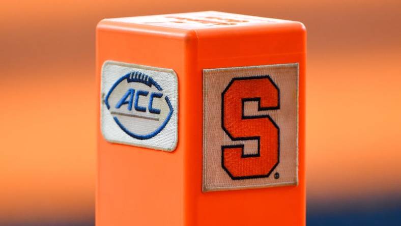 Sep 18, 2021; Syracuse, New York, USA; Detailed view of an end zone marker with the Atlantic Coast Conference and Syracuse Orange logos prior to the game between the against the Albany Great Danes and the Syracuse Orange at the Carrier Dome. Mandatory Credit: Rich Barnes-USA TODAY Sports