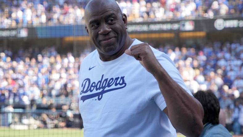 Los Angeles Dodgers co-owner Magic Johnson, part of the new ownership group of Washington's NFL team, hinted the Commanders name could be changed soon. Mandatory Credit: Kirby Lee-USA TODAY Sports
