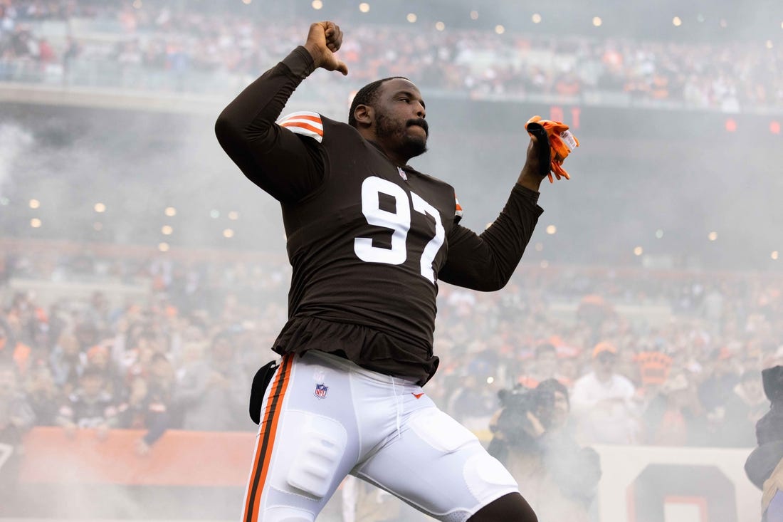 Oct 17, 2021; Cleveland, Ohio, USA; Cleveland Browns defensive tackle Malik Jackson (97) enters the field before the game against the Arizona Cardinals at FirstEnergy Stadium. Mandatory Credit: Scott Galvin-USA TODAY Sports