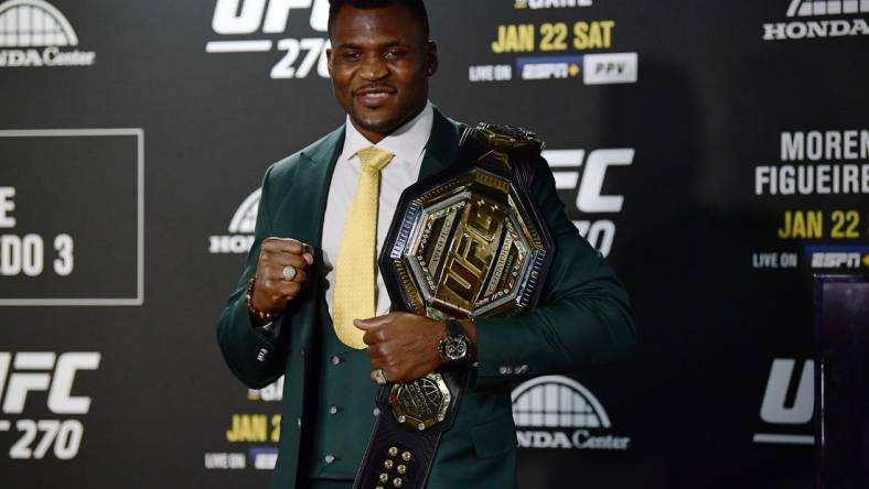 Jan 22, 2022; Anaheim, California, USA; Francis Ngannou poses for photos following his championship victory at UFC 270 at Honda Center. Mandatory Credit: Gary A. Vasquez-USA TODAY Sports