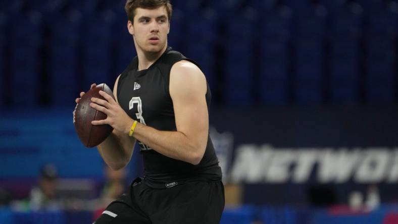 Mar 3, 2022; Indianapolis, IN, USA; Kent State quarterback Dustin Crum (QB03) throws a pass during the 2022 NFL Scouting Combine at Lucas Oil Stadium. Mandatory Credit: Kirby Lee-USA TODAY Sports