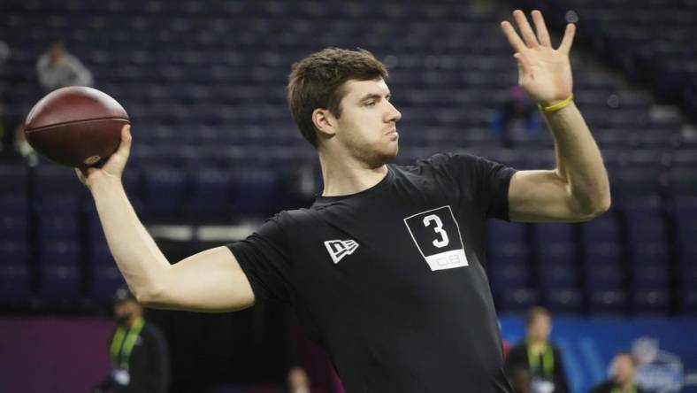 Mar 5, 2022; Indianapolis, IN, USA; Kent State quarterback Dustin Crum (QB03) goes through drills during the 2022 NFL Scouting Combine at Lucas Oil Stadium. Mandatory Credit: Kirby Lee-USA TODAY Sports