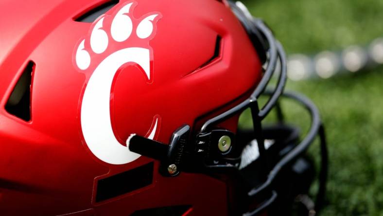 A Cincinnati Bearcats helmet lays on the turf during a spring practice at Nippert Stadium in Cincinnati on Thursday, March 24, 2022.

Cincinnati Bearcats Spring Practice