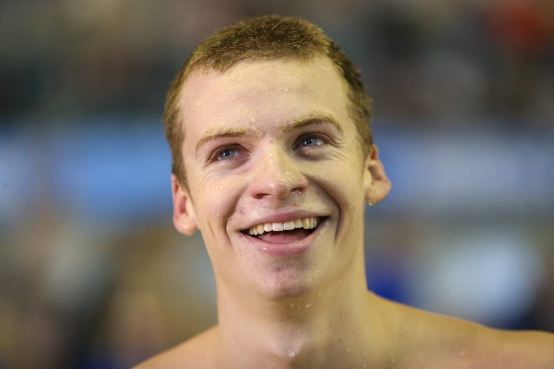 Mar 24, 2022; Atlanta, GA, USA; Arizona State Sun Devils swimmer Leon Marchand celebrates after winning the 200 IM final in the NCAA Mens Swimming & Diving Championships at McAuley Aquatic Center. Mandatory Credit: Brett Davis-USA TODAY Sports