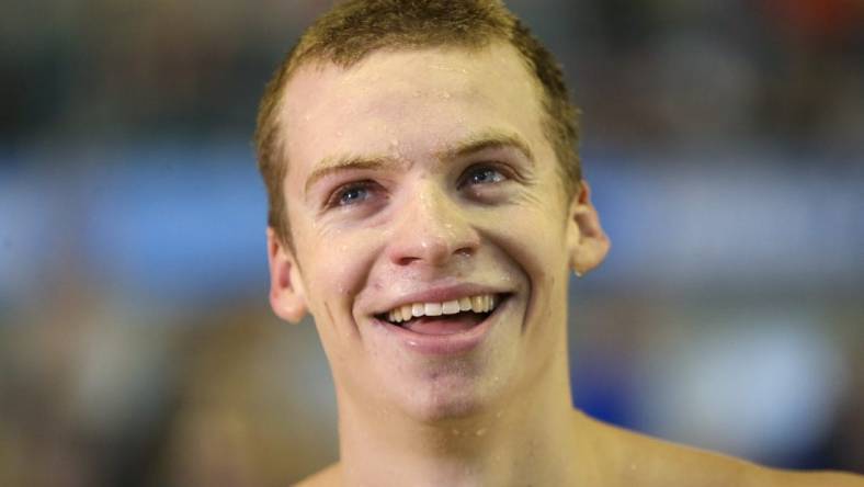 Mar 24, 2022; Atlanta, GA, USA; Arizona State Sun Devils swimmer Leon Marchand celebrates after winning the 200 IM final in the NCAA Mens Swimming & Diving Championships at McAuley Aquatic Center. Mandatory Credit: Brett Davis-USA TODAY Sports