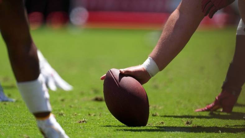 Apr 23, 2022; Los Angeles, CA, USA; A general overall view of the line of scrimmage as Southern California Trojans center Andrew Milek snaps the ball during the spring game at the Los Angeles Memorial Coliseum. Mandatory Credit: Kirby Lee-USA TODAY Sports