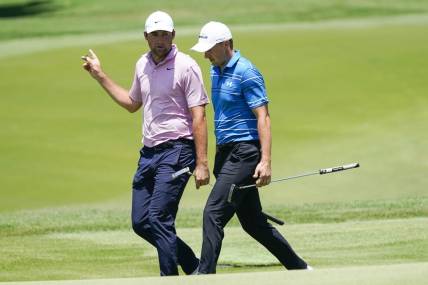 Scottie Scheffler and Jordan Spieth walk to the 9th green during the second round of the AT&T Byron Nelson golf tournament. Mandatory Credit: Raymond Carlin III-USA TODAY Sports