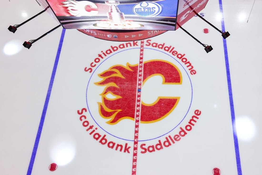 May 18, 2022; Calgary, Alberta, CAN; General view of the Calgary Flames logo on the ice prior to the game between the Calgary Flames and the Edmonton Oilers in game one of the second round of the 2022 Stanley Cup Playoffs at Scotiabank Saddledome. Mandatory Credit: Sergei Belski-USA TODAY Sports