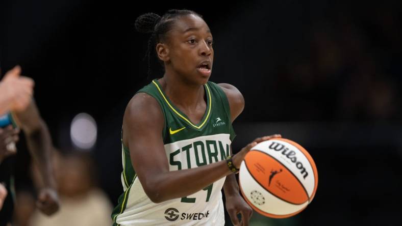 May 29, 2022; Seattle, Washington, USA; Seattle Storm guard Jewell Loyd (24) dribbles the ball against the New York Liberty at Climate Pledge Arena. Mandatory Credit: Stephen Brashear-USA TODAY Sports