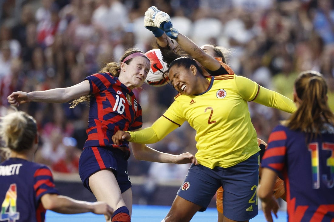 Jun 28, 2022; Sandy, Utah, USA; USA midfielder Rose Lavelle (16) battles Columbia defender Manuela Vanegas (2) and goalkeeper Catalina Perez (1) in the first half during an international friendly soccer match at Rio Tinto Stadium. Mandatory Credit: Jeffrey Swinger-USA TODAY Sports