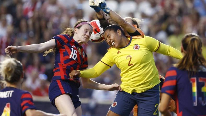 Jun 28, 2022; Sandy, Utah, USA; USA midfielder Rose Lavelle (16) battles Columbia defender Manuela Vanegas (2) and goalkeeper Catalina Perez (1) in the first half during an international friendly soccer match at Rio Tinto Stadium. Mandatory Credit: Jeffrey Swinger-USA TODAY Sports