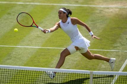 Jul 3, 2022; London, United Kingdom; Caroline Garcia (FRA) returns a shot during her match against Marie Bouzkova (CZE) on day seven at All England Lawn Tennis and Croquet Club. Mandatory Credit: Susan Mullane-USA TODAY Sports
