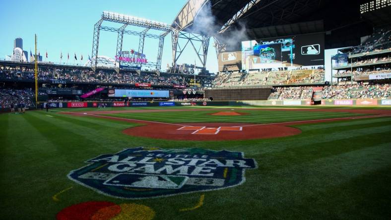 Jul 22, 2022; Seattle, Washington, USA;  The logo of the 2023 All-Star Game which will take place in Seattle is painted behind home plate before the game between the Seattle Mariners and the Houston Astros at T-Mobile Park. Mandatory Credit: Lindsey Wasson-USA TODAY Sports